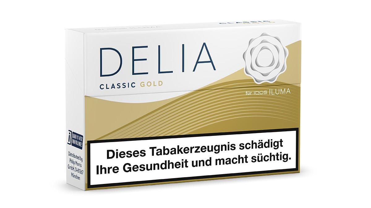 DELIA Classic Gold Tabaksticks für IQOS Iluma Geräte in einer Packung mit 20 Stück, inklusive gesetzlichem Warnhinweis auf der Vorderseite.