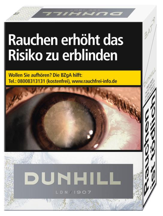 Weiße Packung Dunhill White MP Filterzigaretten von Dunhill, die 26 Stück enthält. Das Design in Schwarz und Grau zeigt ein auffälliges Augenmotiv und die Jahreszahl 1907. Diese milden Filterzigaretten sind in einer Reloc Verpackung mit verbessertem Versc