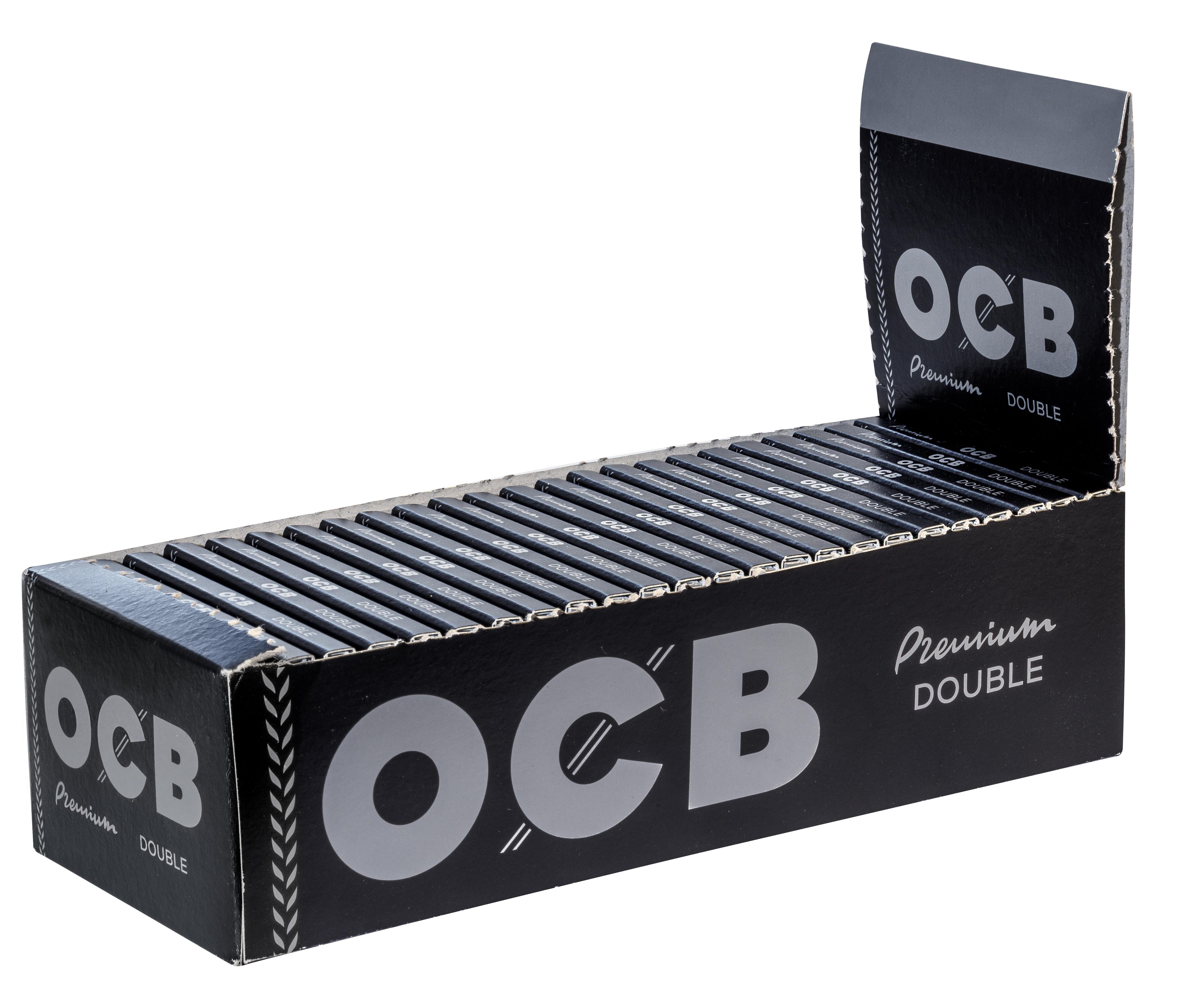 OCB Premium No. 4 schwarzes Zigarettenpapier aus Hanffasern als Stange mit 25 Packungen zu je 100 Blatt in einer rechteckigen Box.